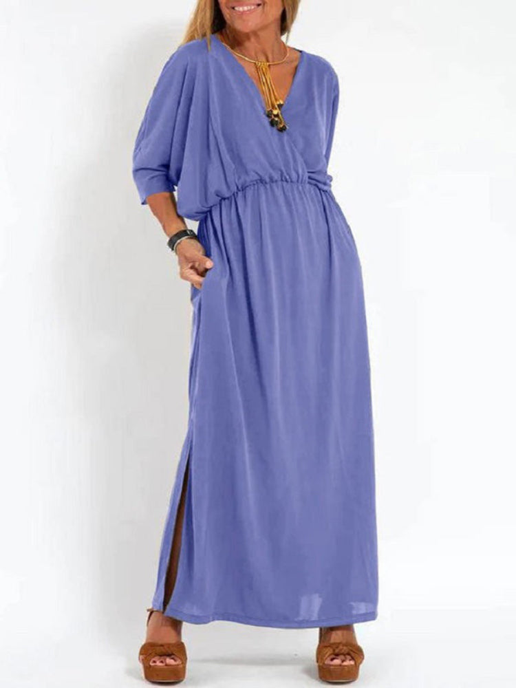 Vestido longo com fenda e bolsos, cintura elástica e manga curta, conforto máximo