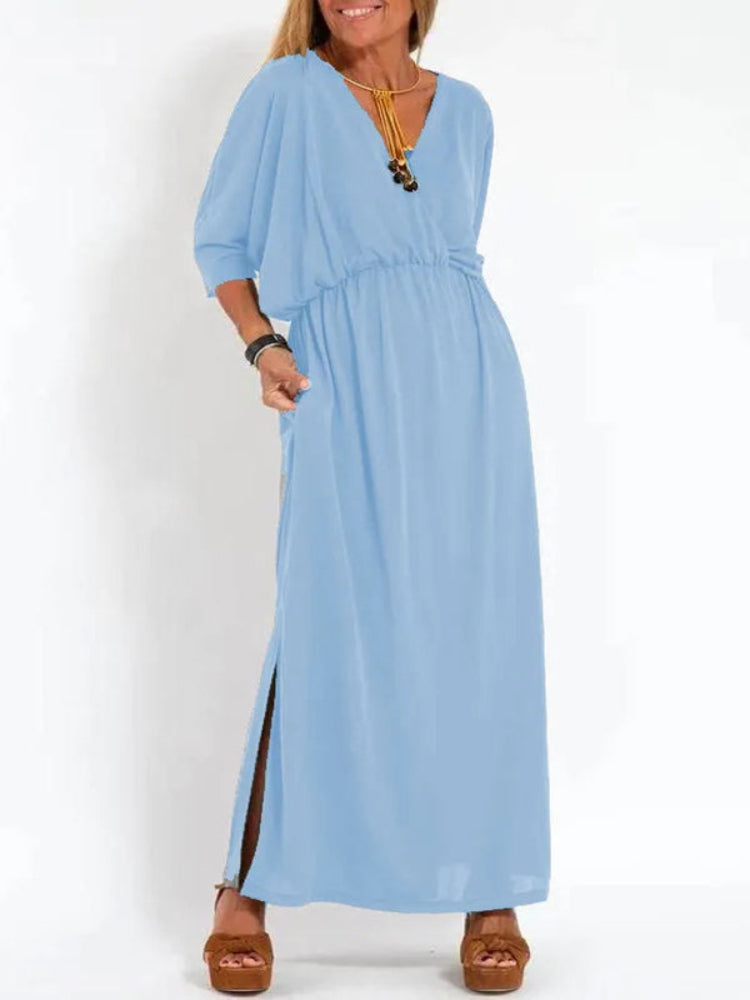 Vestido longo com fenda e bolsos, cintura elástica e manga curta, conforto máximo