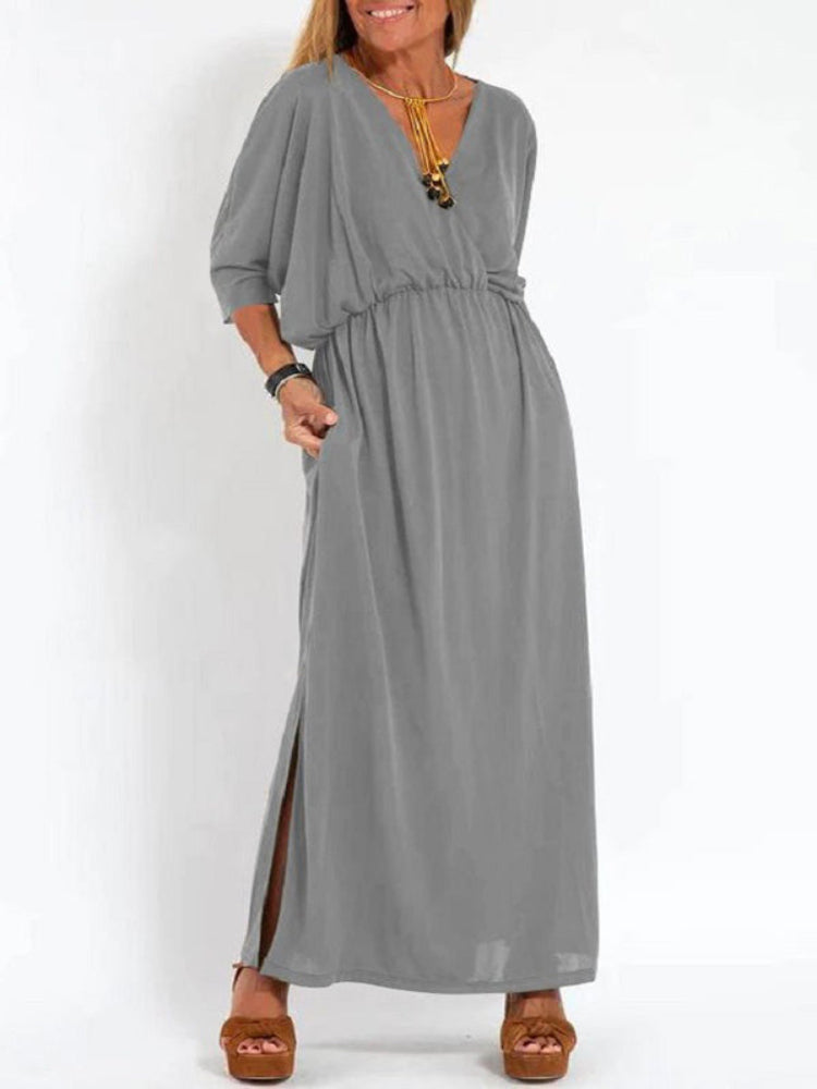 Vestido longo com fenda e bolsos, cintura elástica e manga curta, conforto máximo