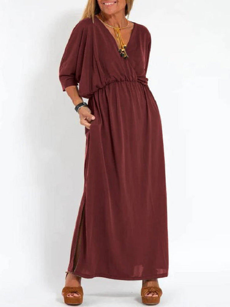 Vestido longo com fenda e bolsos, cintura elástica e manga curta, conforto máximo