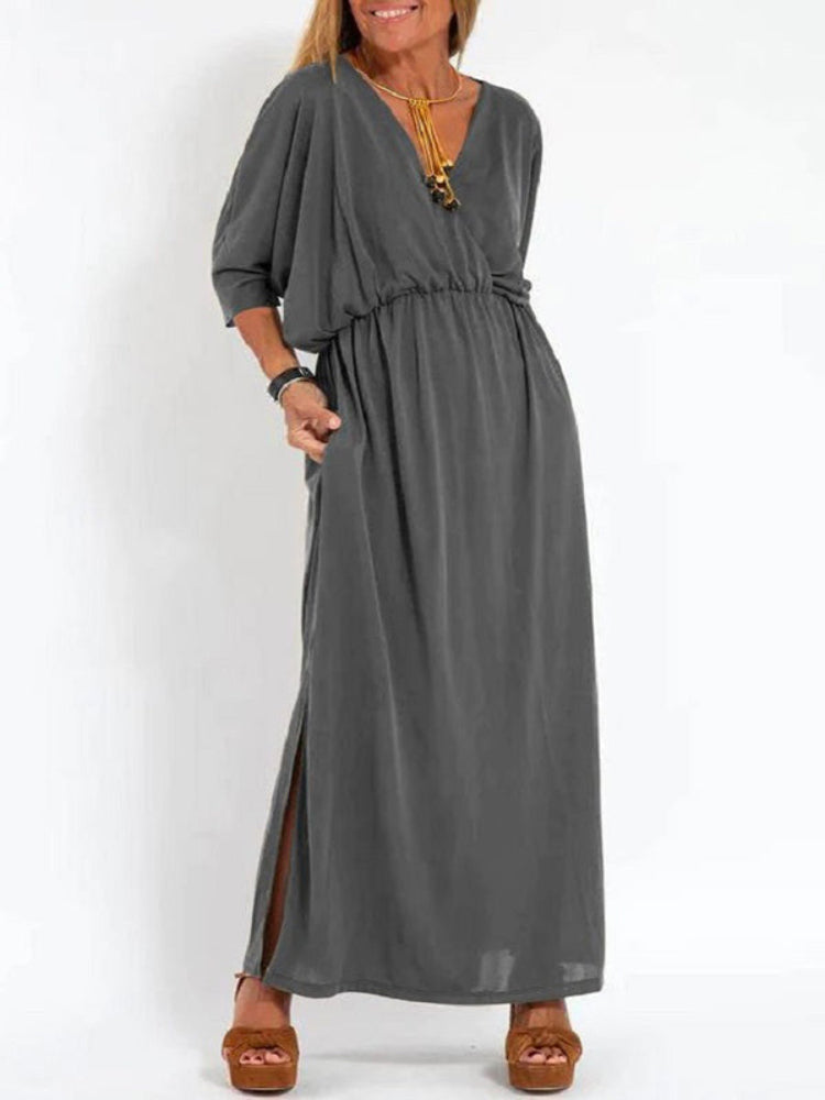 Vestido longo com fenda e bolsos, cintura elástica e manga curta, conforto máximo