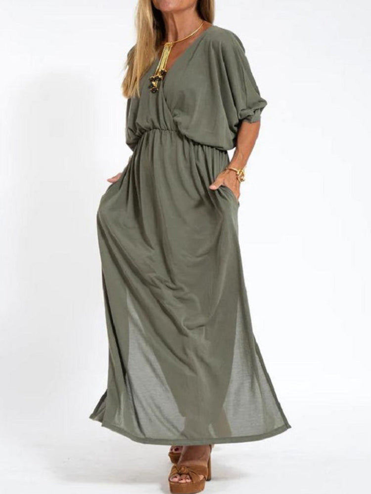 Vestido longo com fenda e bolsos, cintura elástica e manga curta, conforto máximo