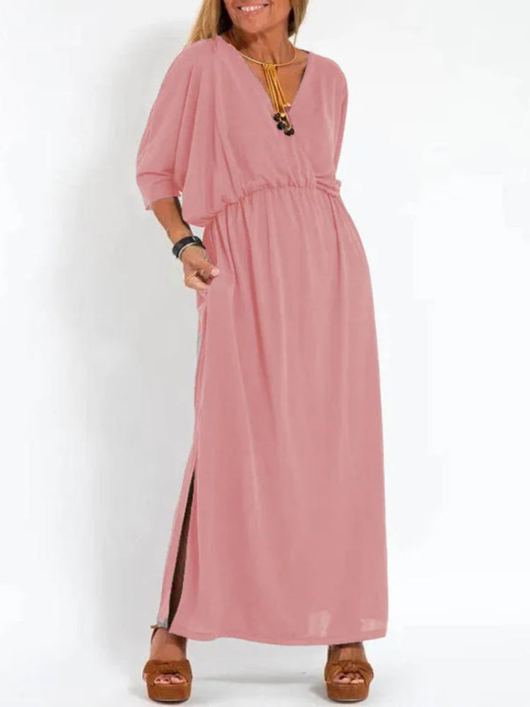 Vestido longo com fenda e bolsos, cintura elástica e manga curta, conforto máximo
